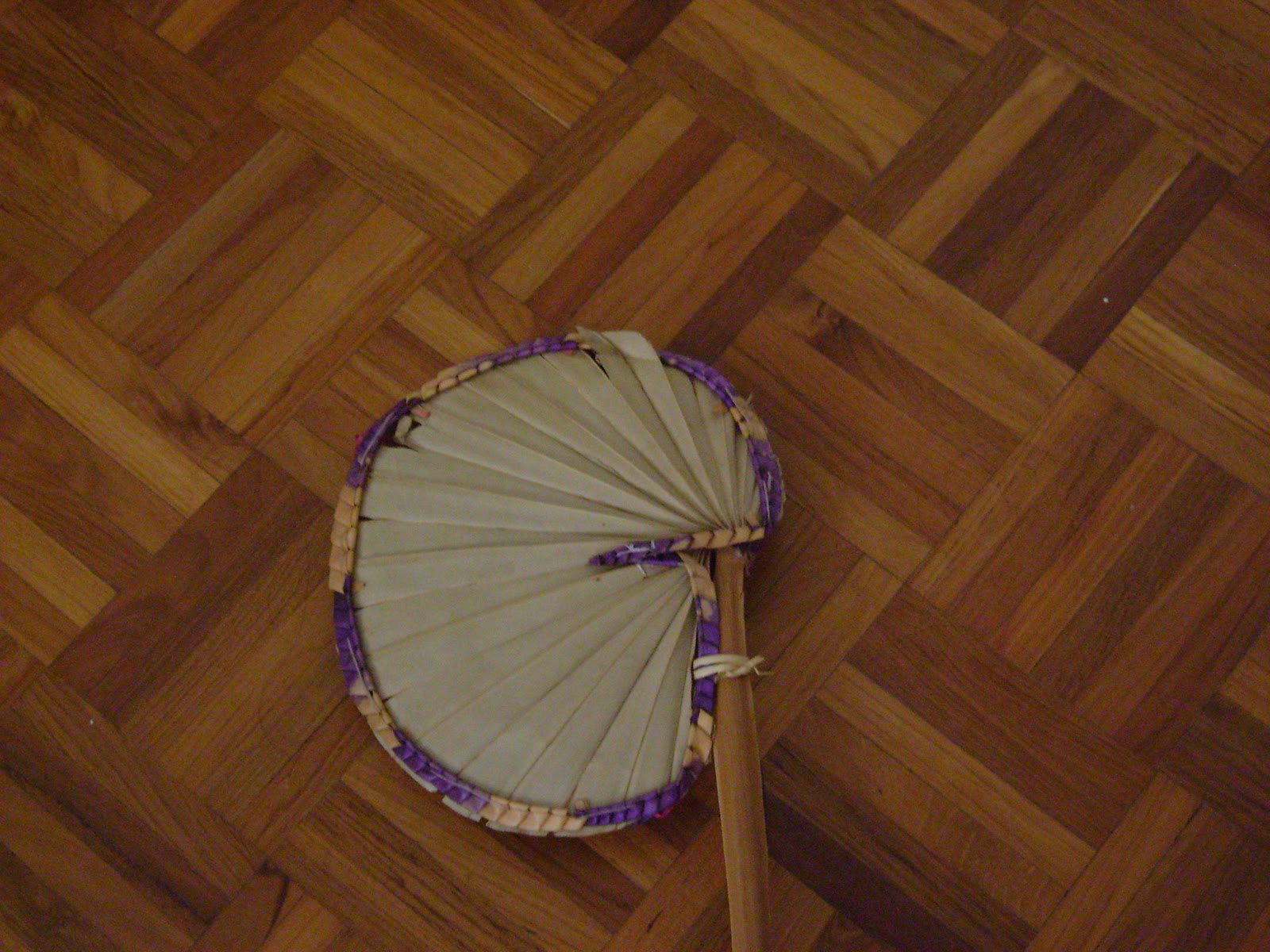 Ramana laughs with a devotee